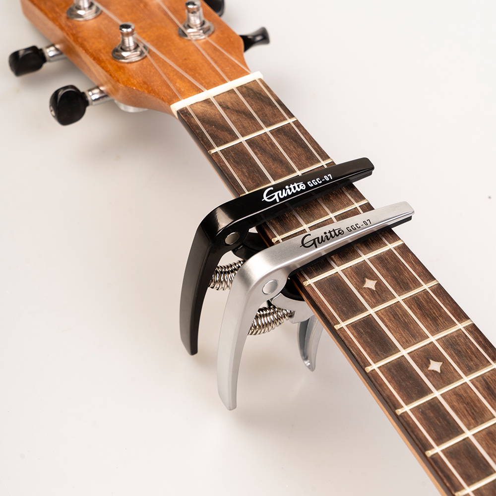 GUITTO GGC-07 Ukulele Capo Qui - đánh giá và giá Musical Instrument Dulcimer