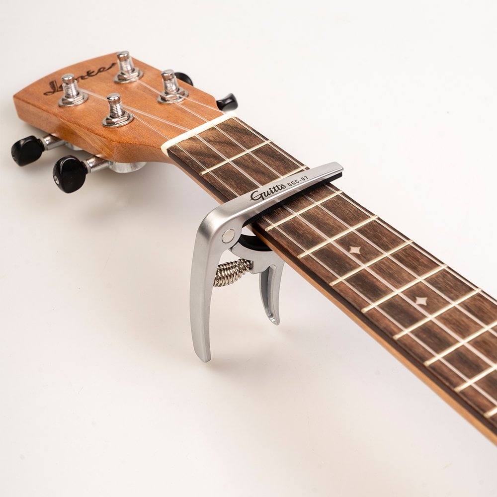 GUITTO GGC-07 Ukulele Capo Qui - đánh giá và giá Musical Instrument Dulcimer